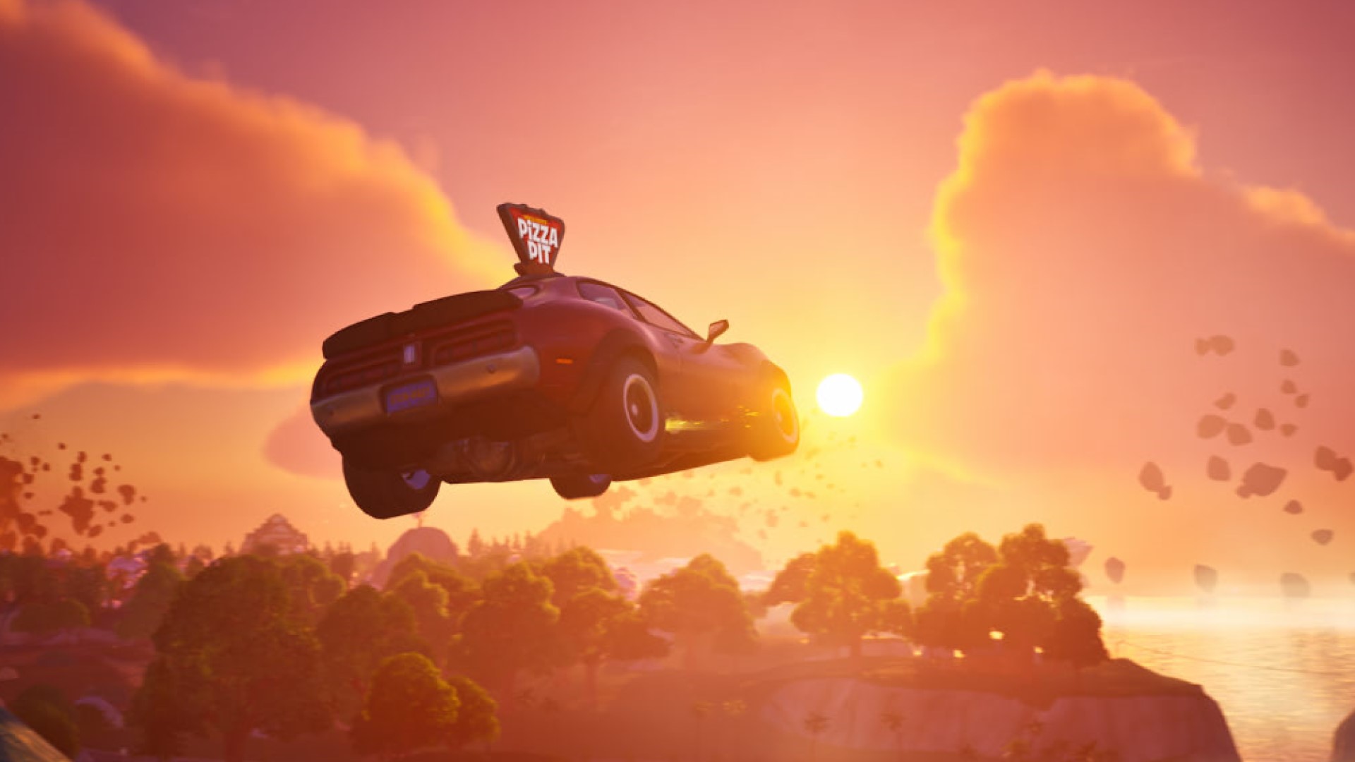 Une voiture à pizza saute à travers un ravin lors d'un lever de soleil pittoresque.