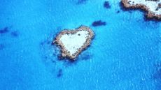 heart shaped island in blue ocean 
