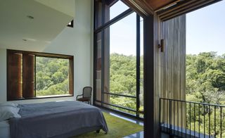 The master bedroom, which is located there, has uninterupted views of the natural surroundings