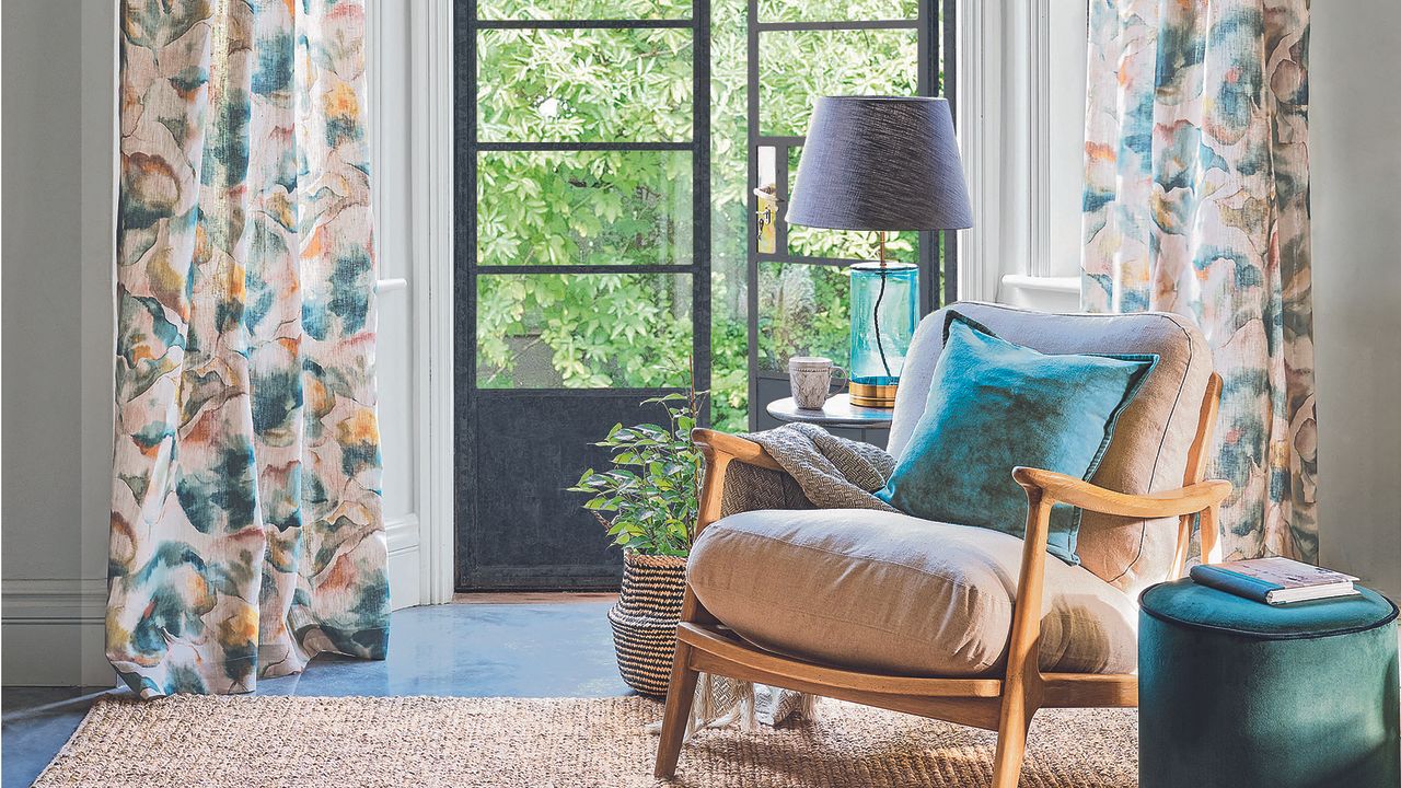 Living room with glass french doors and an armchair.