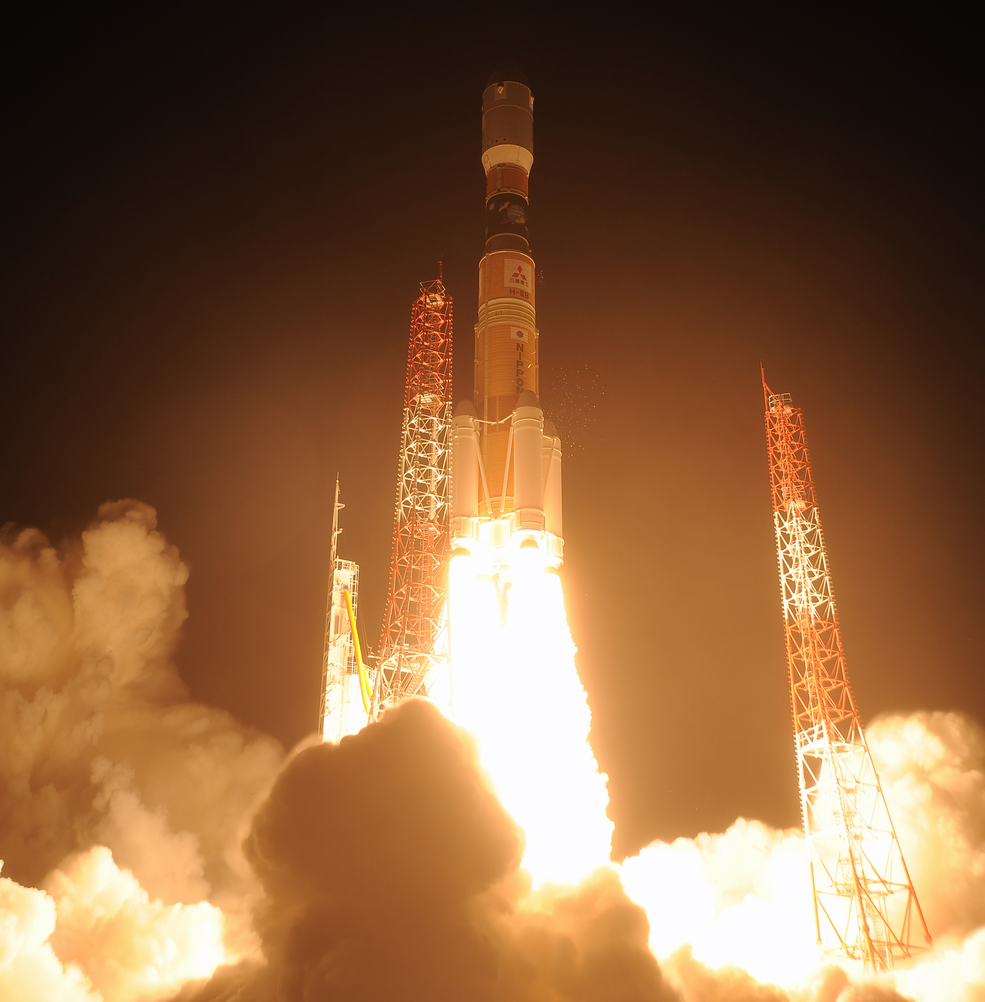 A Japanese H-IIB rocket launches the HTV-5 cargo ship toward the International Space Station on Aug. 19, 2015. Among the 4.5 tons cargo riding on HTV-5 were several samples of liquor for the Suntory Global Innovation Center to test how booze mellows in sp