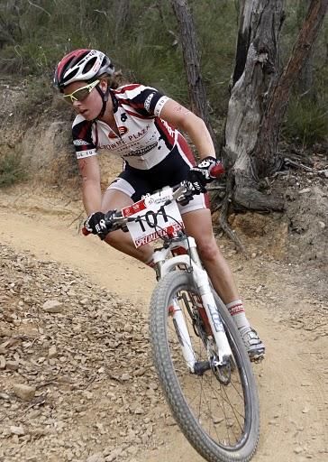 Rebecca Henderson (Crowne Plaza Canberra) races at the front of the Under 23 women.