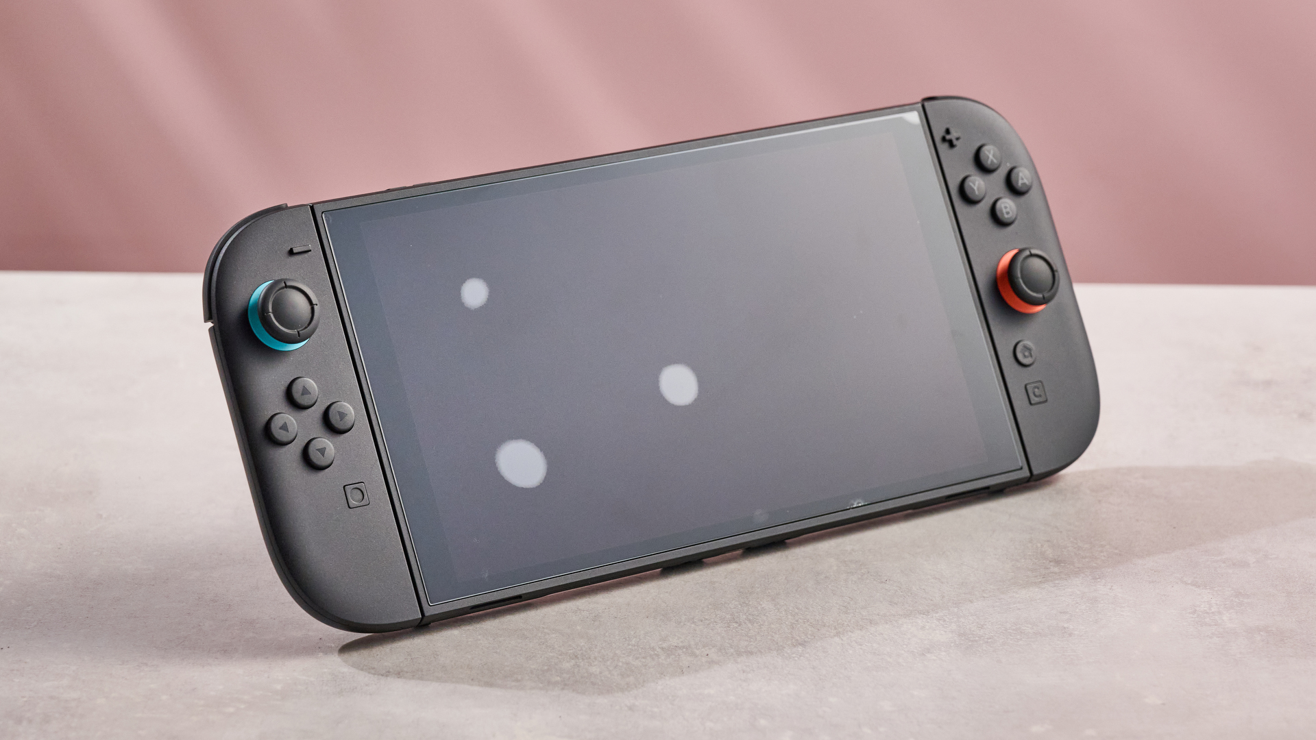 Multiple bubbles remain under the Snakebyte Starter Kit S2 screen protector once applied to the Switch 2.