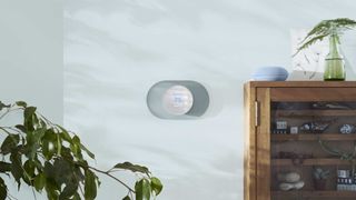 Nest Thermostat in Fog installed on a wall