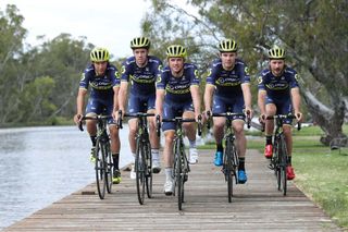 Some of the men's team, including Simon Gerrans and Mat Hayman ride out in the new kit