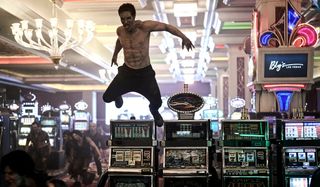 A zombie leaps into attack from a slot machine in Army of the Dead.
