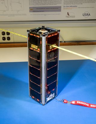 The National Science Foundation-funded Firefly CubeSat, which is just big enough to fit three cans of soda.