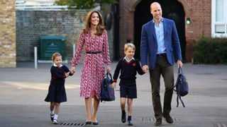 Princess Charlotte arrives for her first day of school, with her brother Prince George and the Prince and Princess of Wales