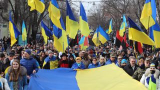 Ukrainians march in protest at Russian aggression in the city of Odessa