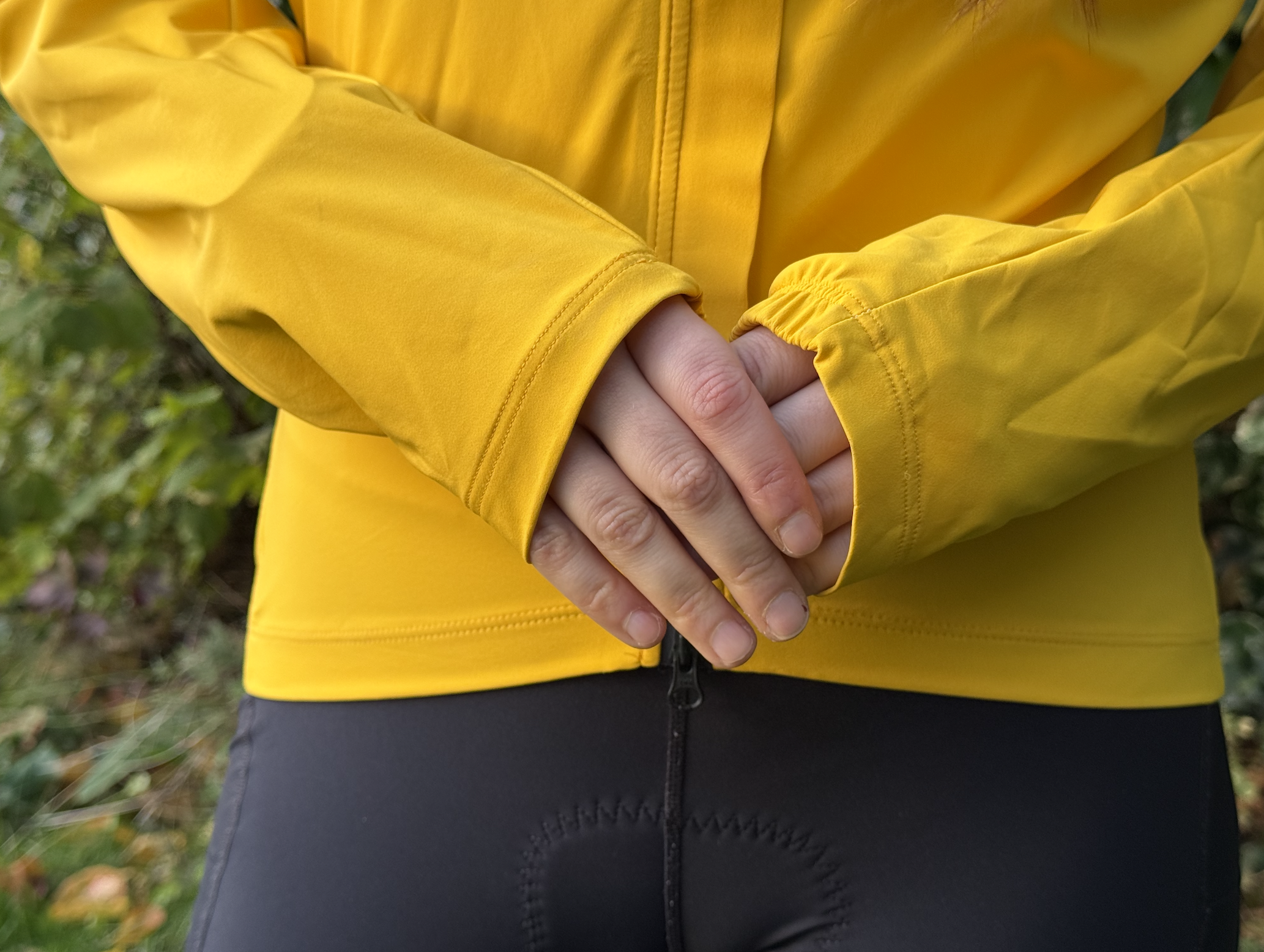 Shot of hands in sleeves showing them a little bit long, and with loose elastic.