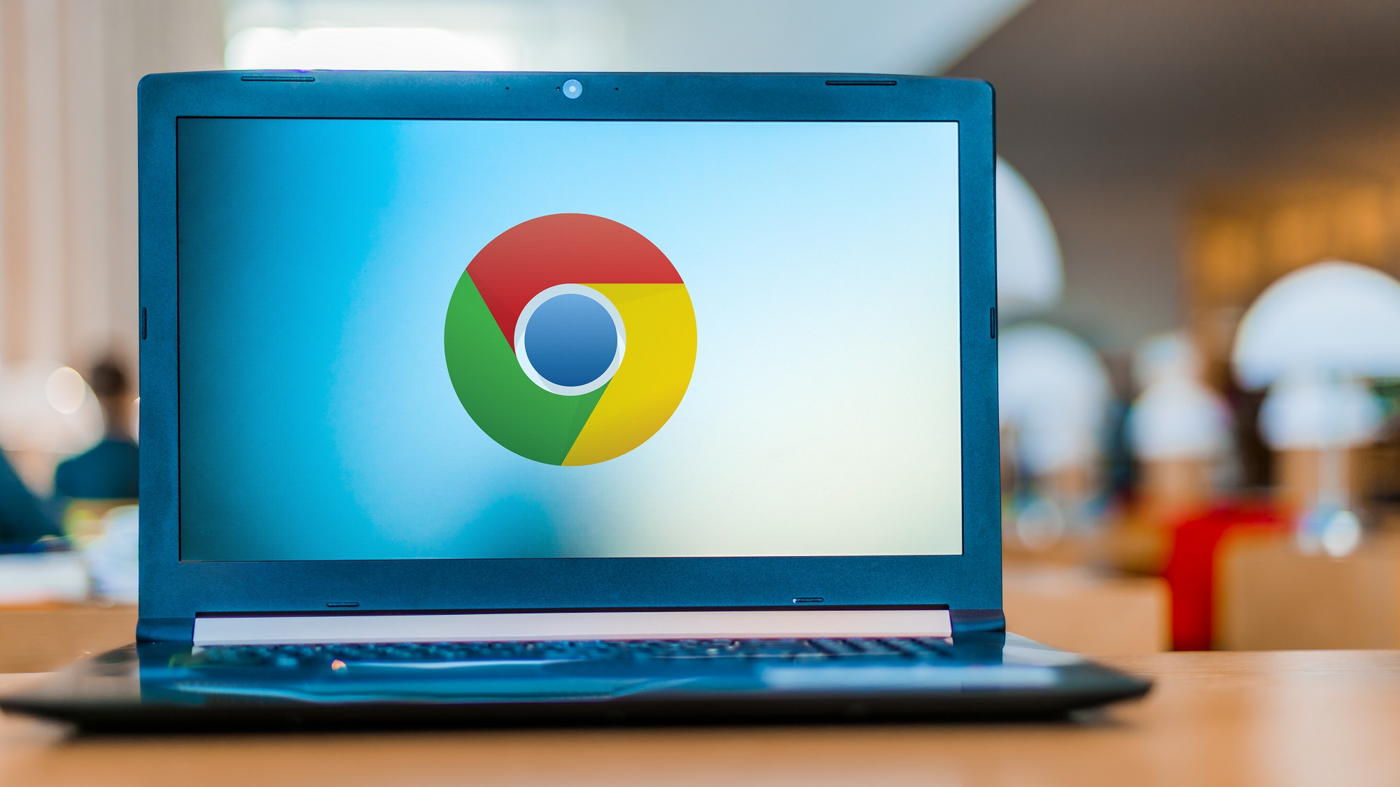 Laptop computer displaying logo of Google Chrome, a cross-platform web browser developed by Google.