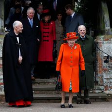 britains queen elizabeth ii c and britains prince philip, duke of edinburgh r lead out other members of the family with reverend canon jonathan riviere l as they leave after attending the royal familys traditional christmas day church service at st mary magdalene church in sandringham, norfolk, eastern england, on december 25, 2017 photo by adrian dennis afp photo by adrian dennisafp via getty images