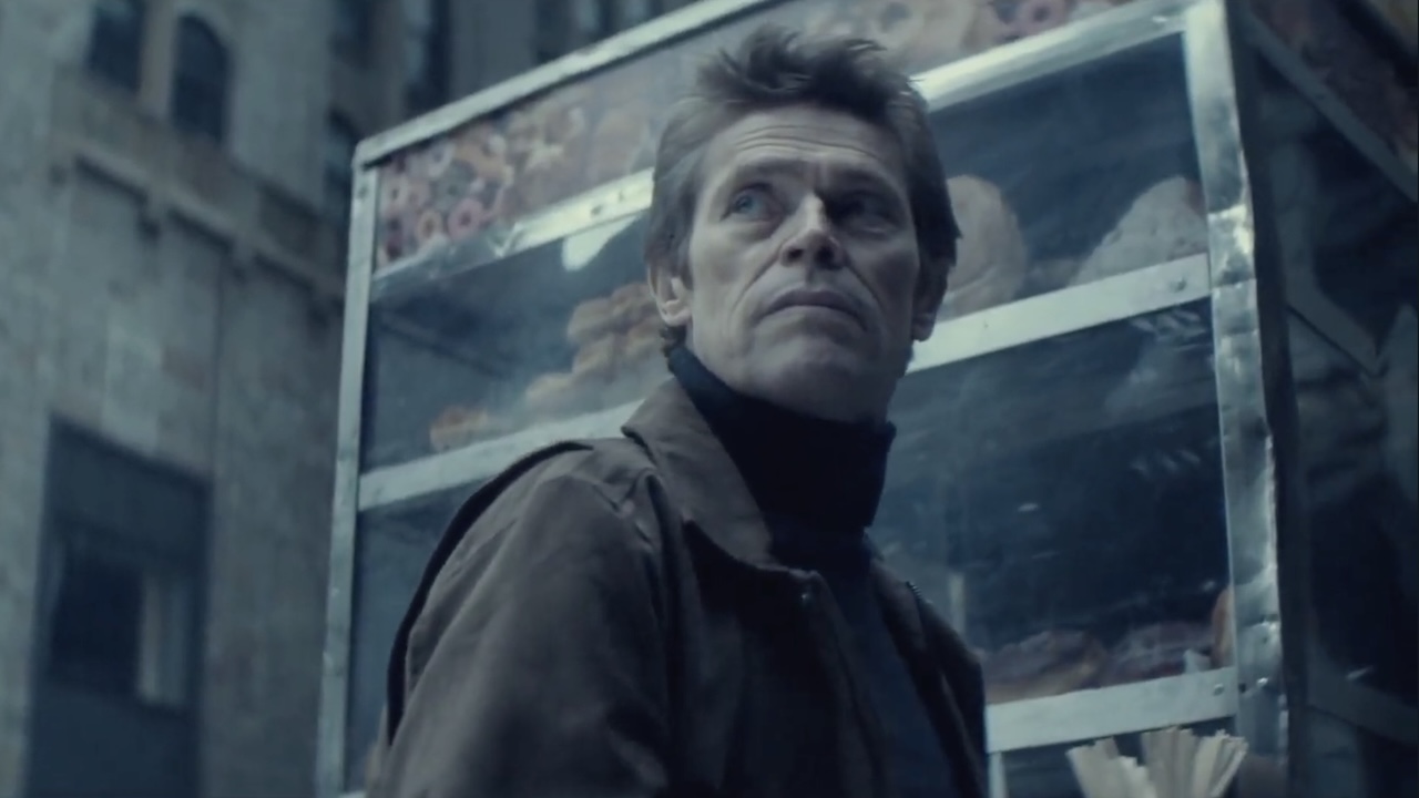 Willem Dafoe's Marcus looking up at The Continental in the first John Wick movie