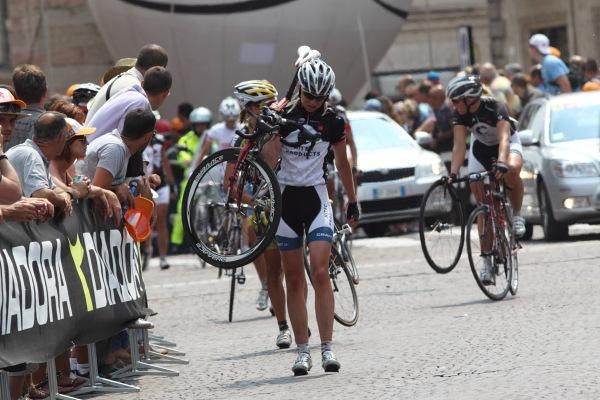 Riders carried their bikes over the finish line after the crash
