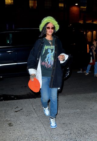 Rihanna in a big fur hat