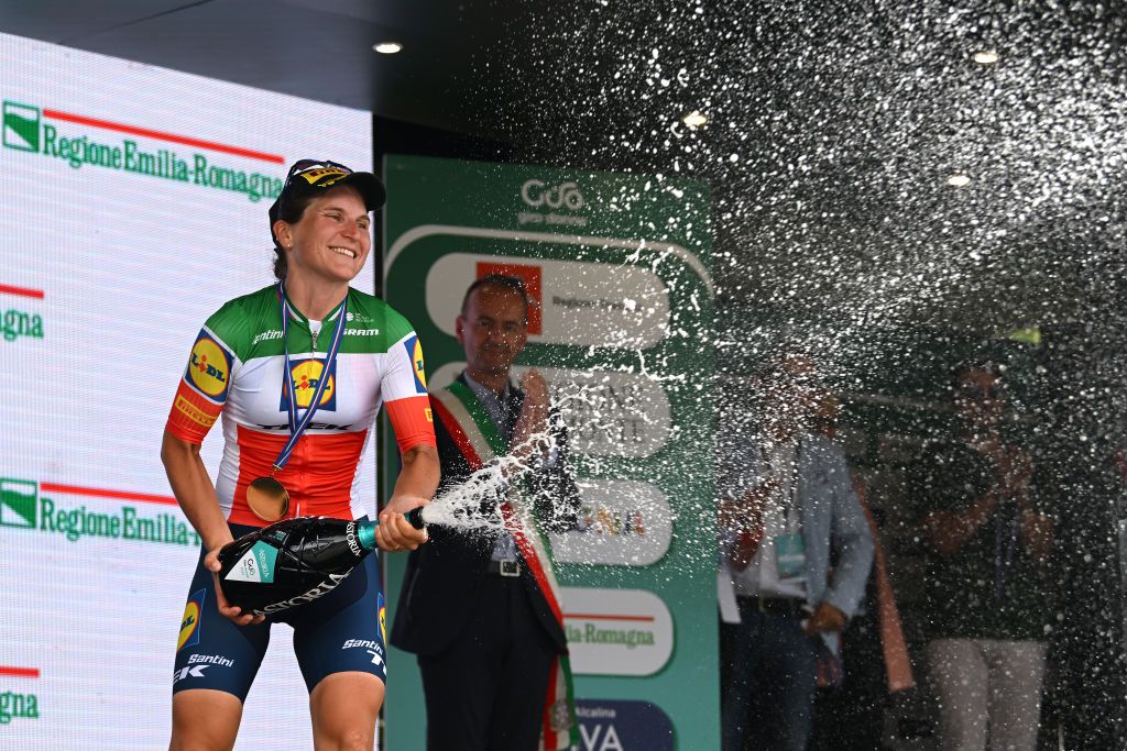 BORGO VAL DI TORO ITALY JULY 03 Elisa Longo Borghini of Italy and Team Lidl Trek celebrates at podium as stage winner during the 34th Giro dItalia Donne 2023 Stage 4 a 134km stage from Fidenza to Borgo Val di Toro UCIWWT on July 03 2023 in Borgo Val di Toro Italy Photo by Dario BelingheriGetty Images