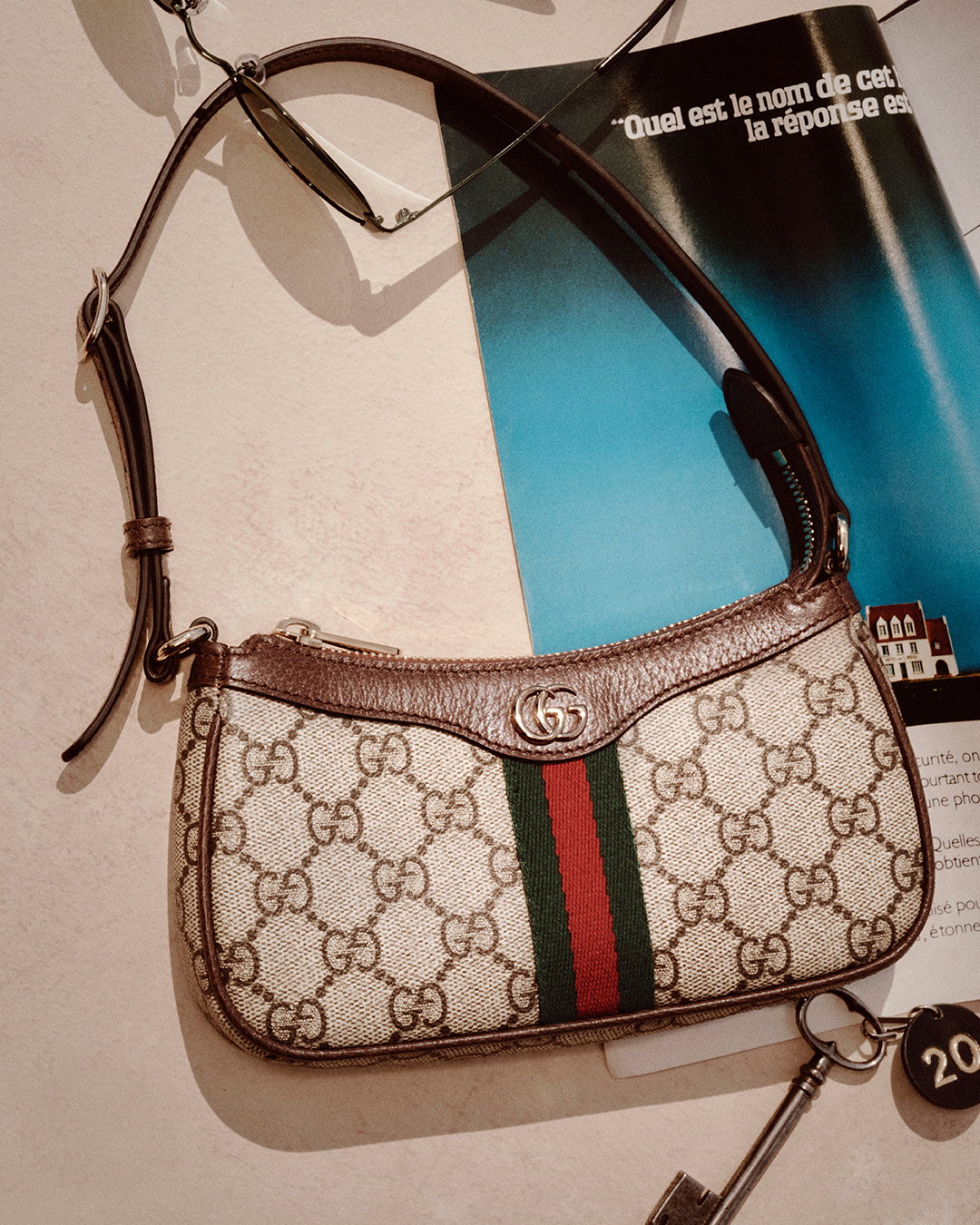 Gucci monogram bag in the new Gucci campaign.