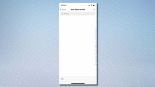 A screenshot of the "Text Replacement" menu on iPhone with the + icon in the top-right corner being selected