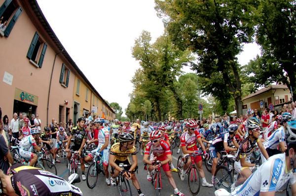 The peloton awaits the start in Imola.