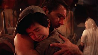 Indiana Jones hugging Short Round in Temple of Doom
