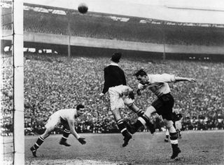 Scotland and England in action at Hampden Park in 1939.
