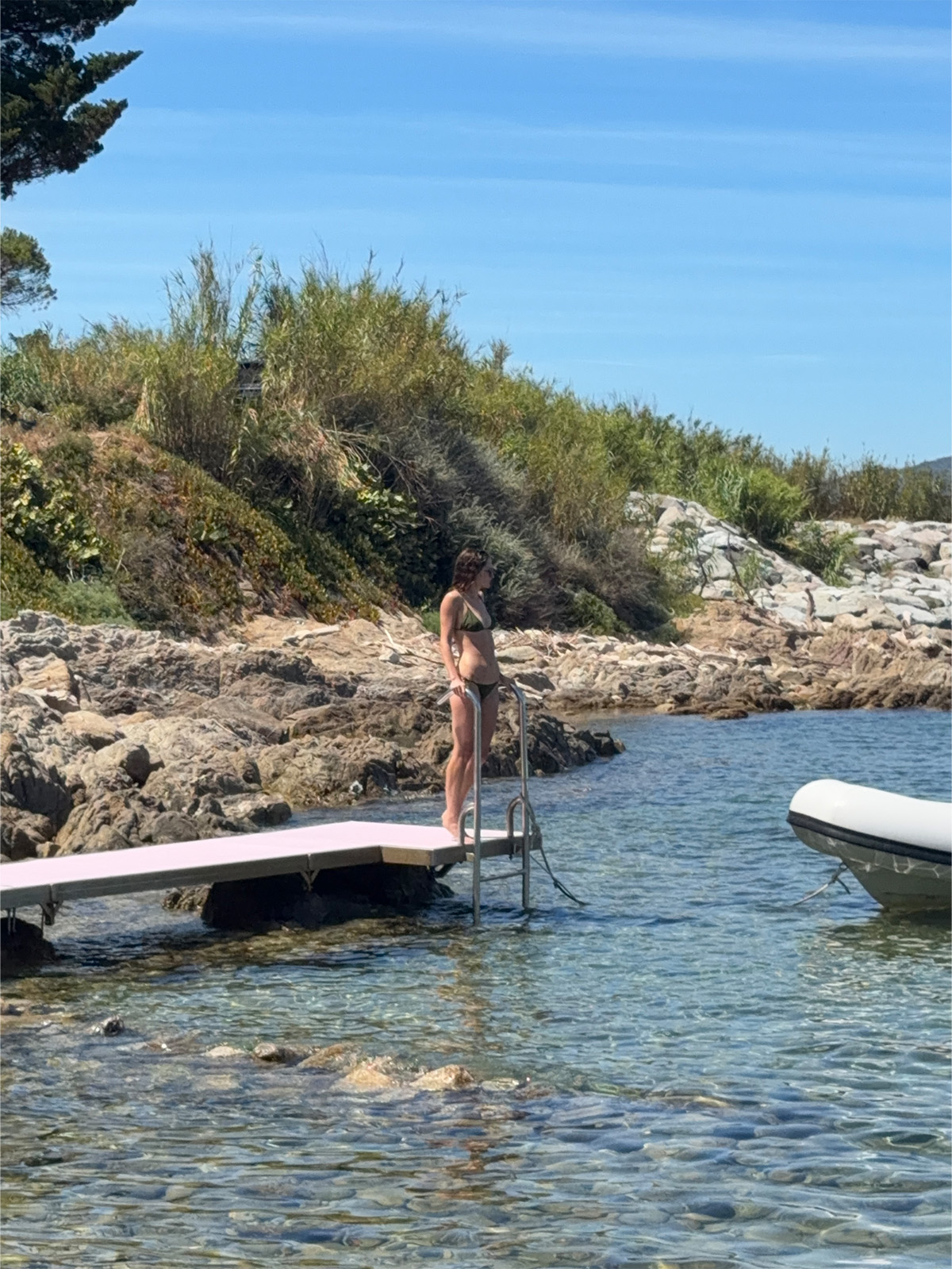 Eliza Huber on the dock at the Alo beach club.