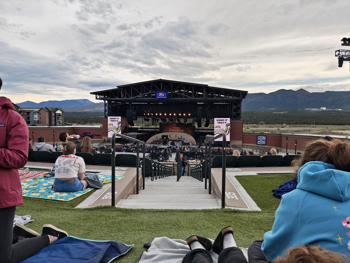 Photos of a stage at an outdoor concert
