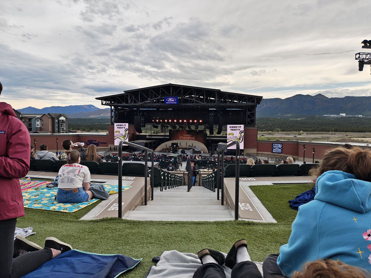 Photos of a stage at an outdoor concert