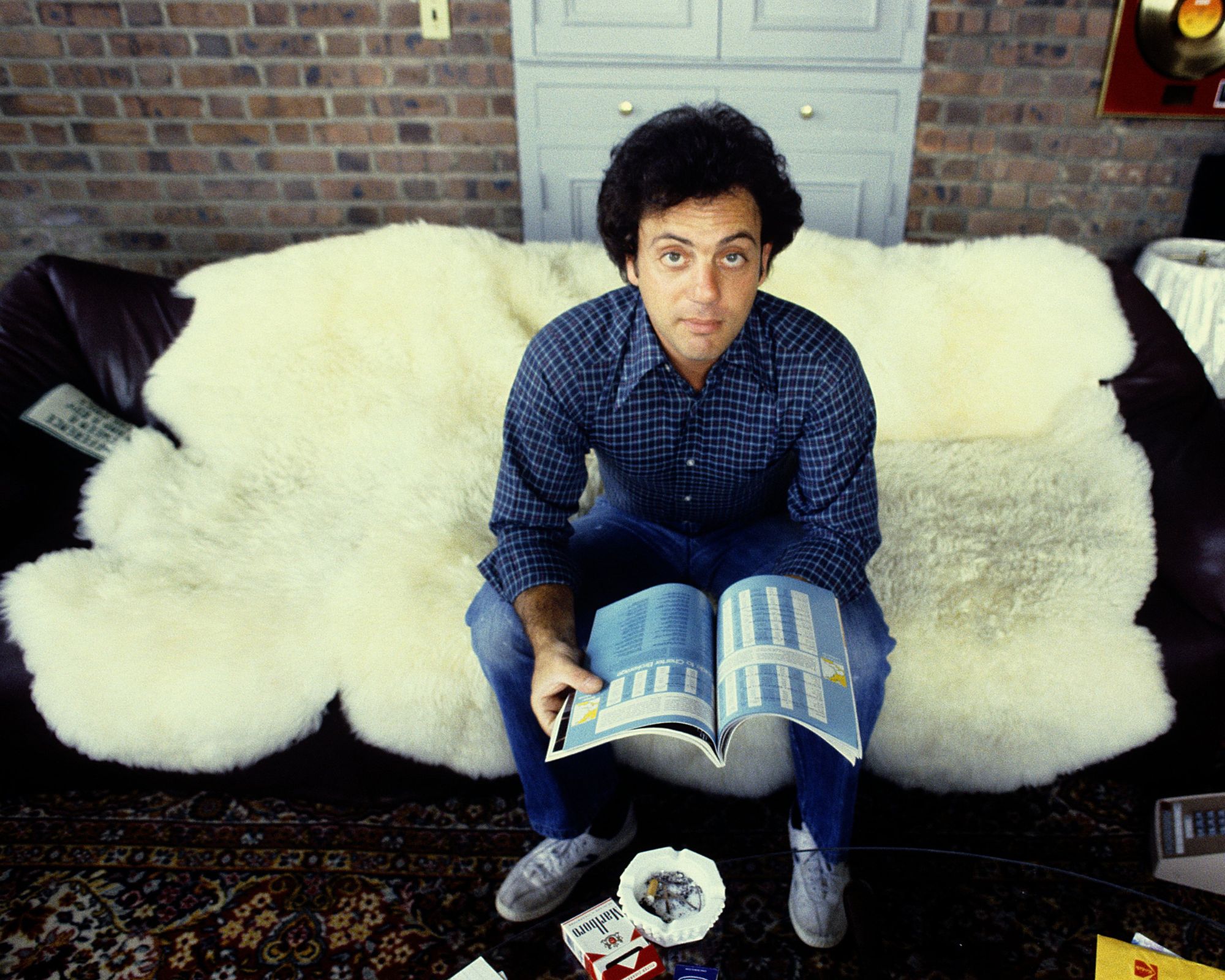 billy joel on his couch