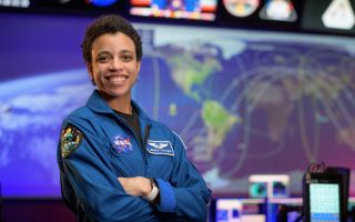 A portrait of NASA astronaut Jessica Watkins, who is set to become the first Black woman to embark on a long-duration space mission. 