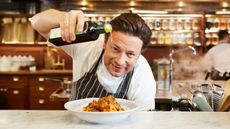 Jamie oliver cooking pasta in his studio