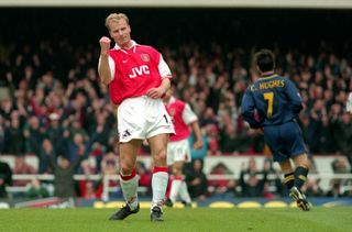 Dennis Bergkamp celebrates a goal for Arsenal against Wimbledon in September 1998.