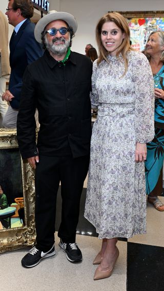 Mr. Brainwash and Princess Beatrice of York attend the presentation of Mr. Brainwash by Clarendon Fine Art and Jack Barclay Bentley