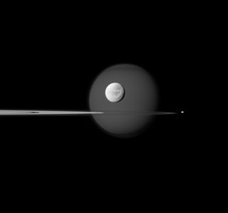 Saturn's Rings and Four Moons