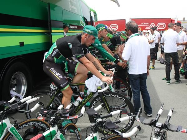 Europcar warms up on their road bikes while their time trial machines sit at the ready.