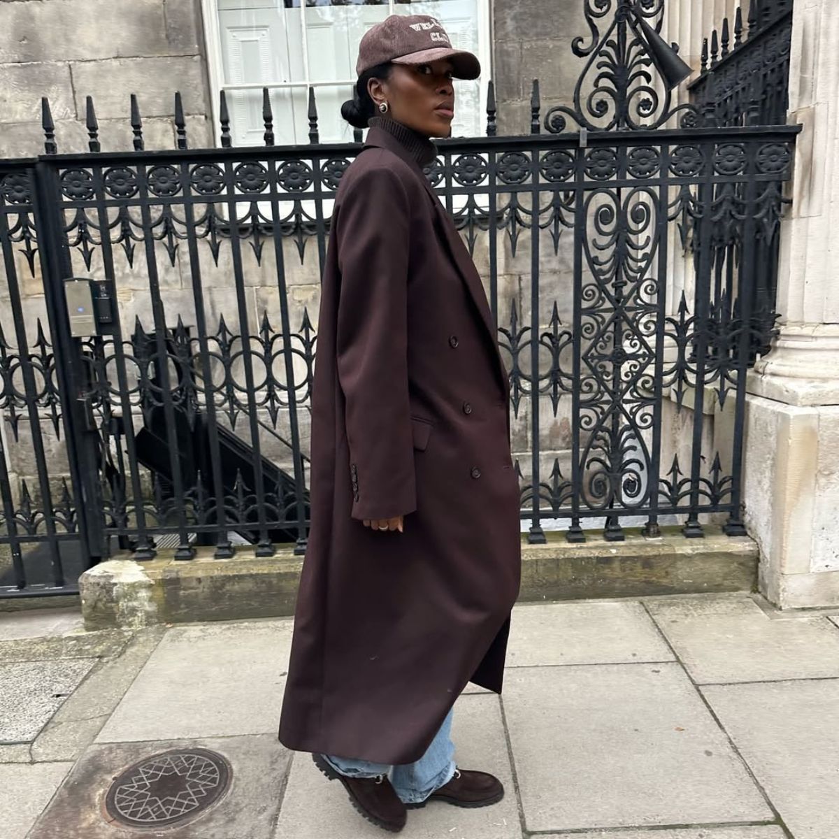 @nlmarilyn wears a brown coat from The Frankie Shop