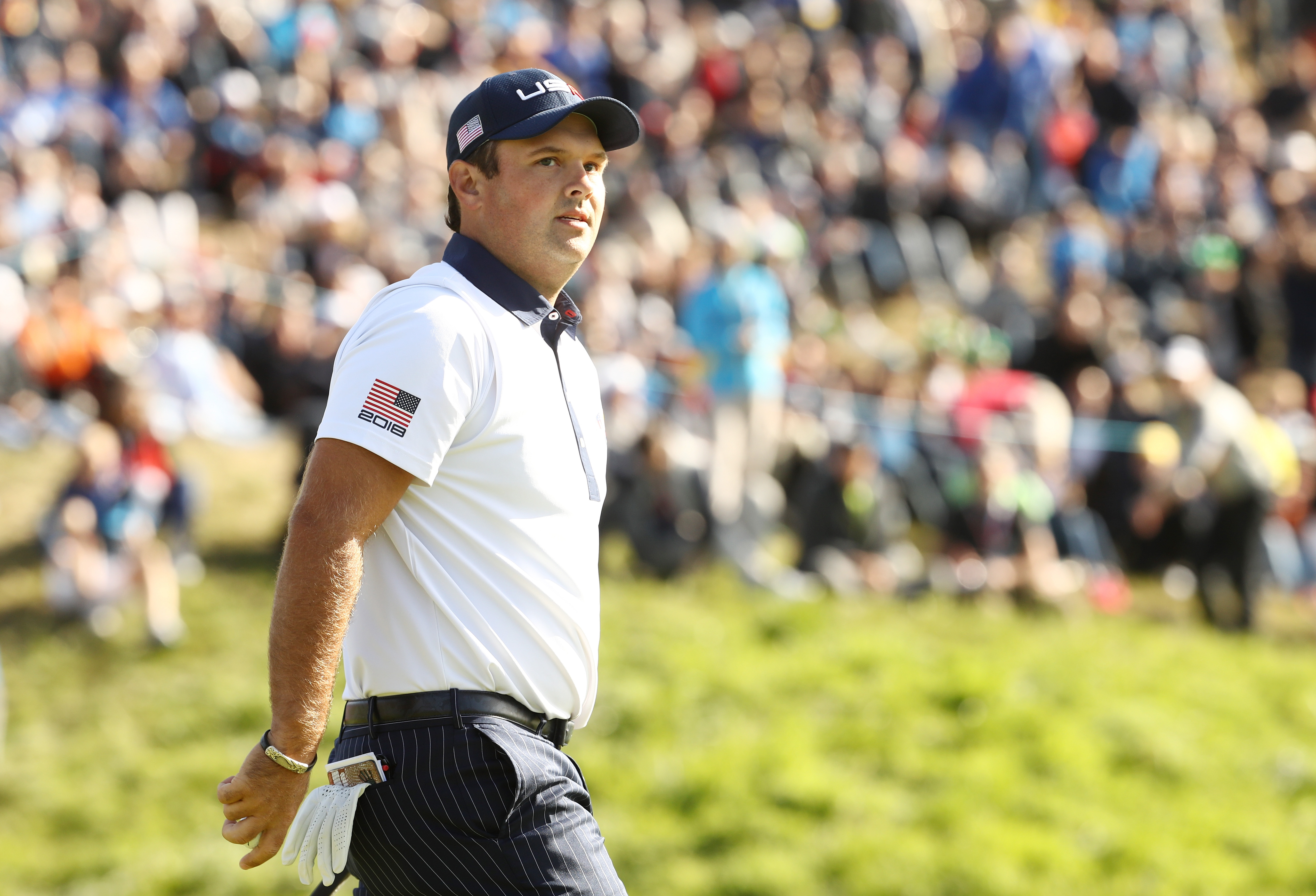 Patrick Reed walks off the green at the 2018 Ryder Cup