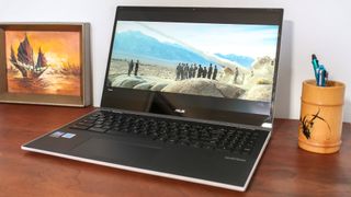 Asus Chromebook Flip CX5 (2022) open on desk showing movie playing