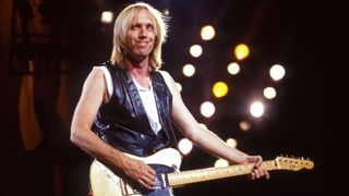 Tom Petty (1950-2017) of Tom Petty and the Hearbreakers performs on stage during the 1987 Rock 'N' Roll Caravan Tour on June 18, 1987 at the Pine Knob Music Theatre in Clarkston, Michigan. 
