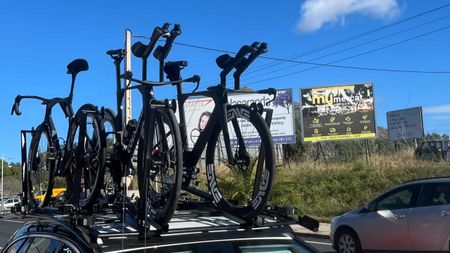 Colnago time trial bikes on a car roof 