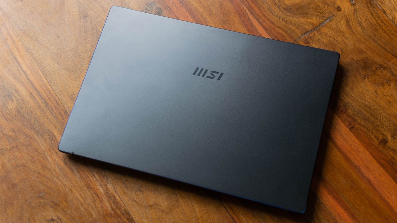 An overhead photograph of the MSI Prestige 14 Evo on a table