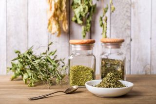 dried herbs in jars