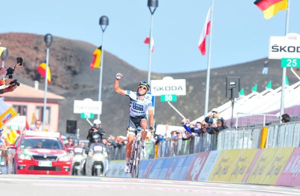 Contador crosses the line first