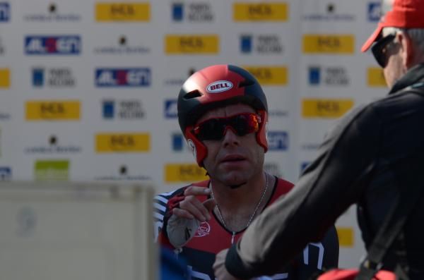 Cadel Evans waits in the hot seat after setting the fastest time in the time trial