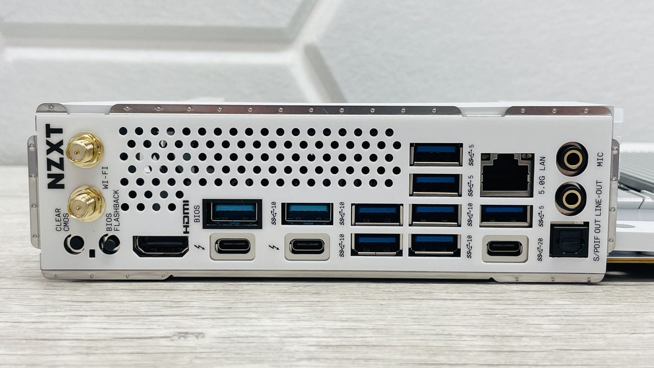 An NZXT N9 Z890 motherboard on a desk with port covers removed.