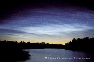 noctilucent clouds over water