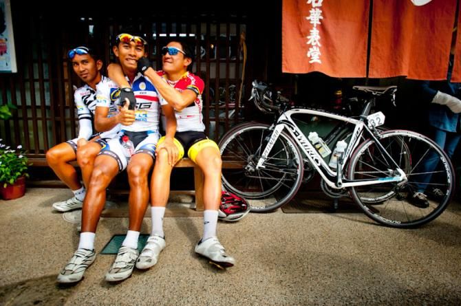Malaysian and Singaporean riders awaiting the race start in jest at Tour of Japan 2012