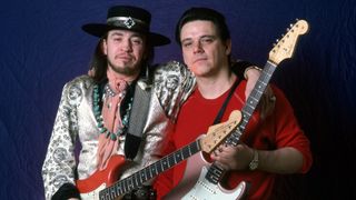American singer, songwriter and Texas blues guitar legend Stevie Ray Vaughan and his brother, American blues-rock guitarist, singer and founder of The Fabulous Thunderbirds Jimmie Vaughan, pose backstage at the Royal Oak Music Theater during the "Soul to Soul" world tour, on February 14, 1986, in Royal Oak, Michigan