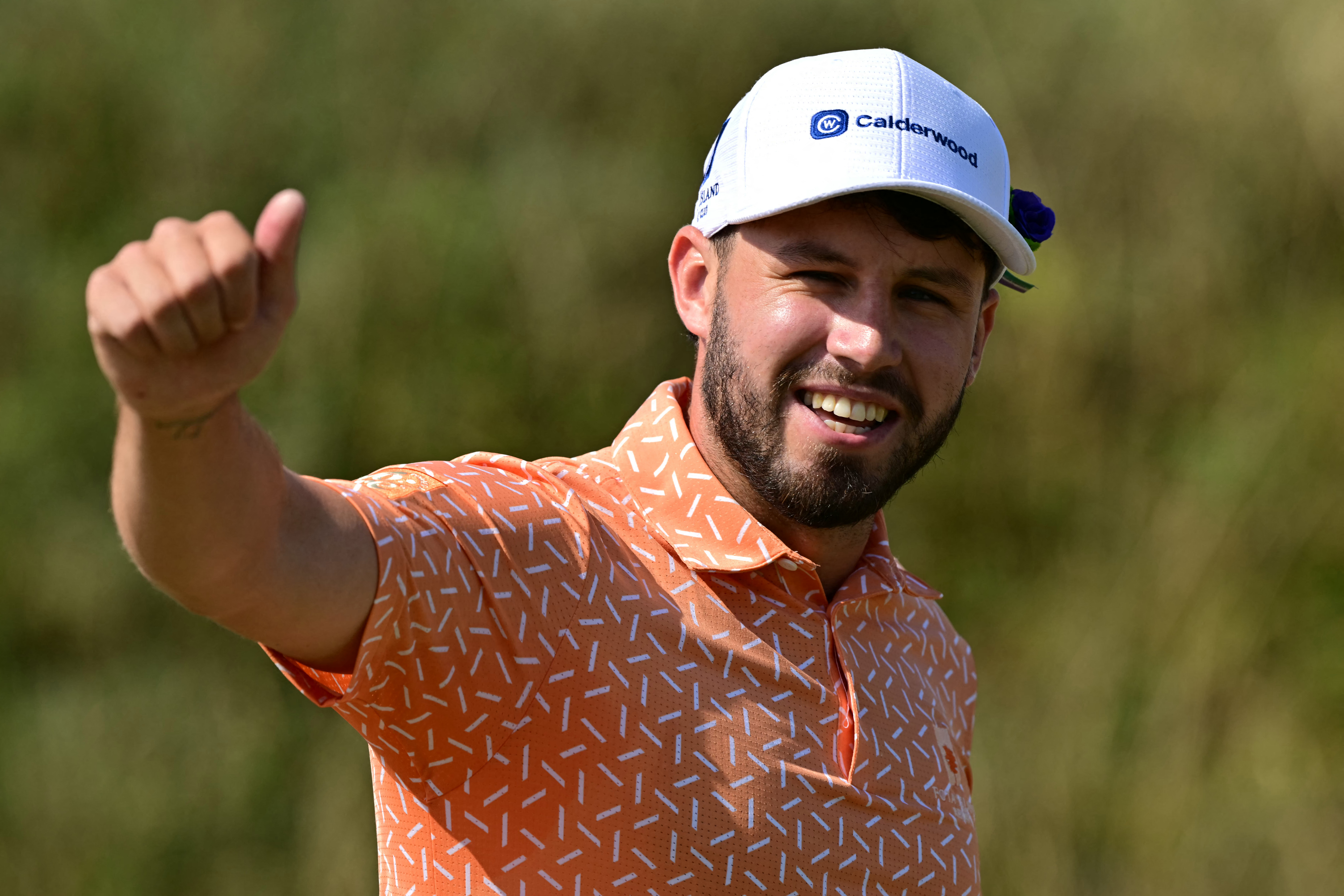 David Howard puts his thumb up to fans during day one of The Open at Royal Birkdale