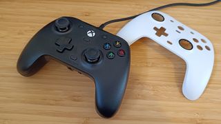 A GameSir G7 Xbox controller with a swappable faceplate sitting on a wooden desk